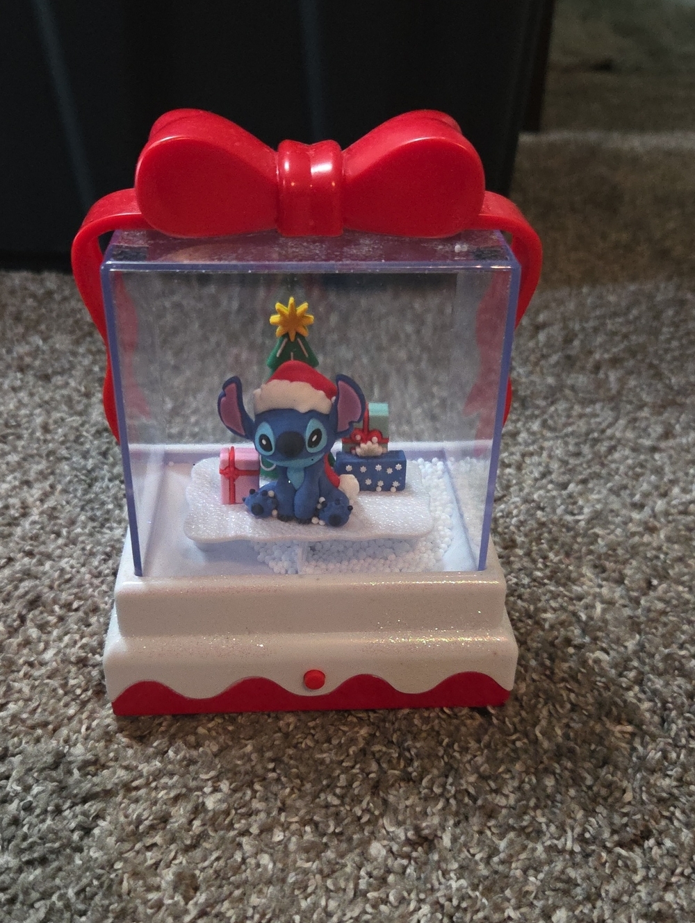 Holiday Stitch Figurine Snow Globe with Red Bow